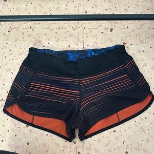 Lululemon Athletica Black and Orange Striped Athletic Shorts